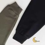 ست بلوز و شلوار دورس پسرانه و دخترانه طرح پازل سایز 5 تا 14 سال - Image 5