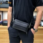 کیف دستی و دوشی چرم طبیعی ظفر دارای بند مچی و بند بلند قابل تنظیم
