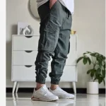 شلوار شش جیب مردانه پارچه نیل سایز 50 تا 60 رنگ طوسی مشکی سبز - تصویر 12